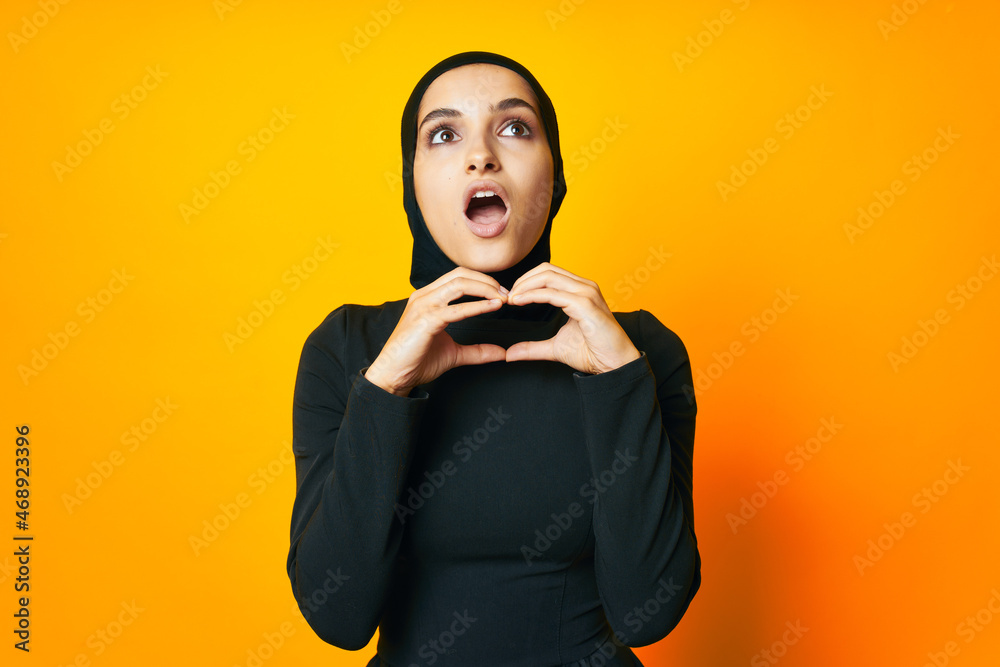 cheerful woman in black hijab posing fashion hand gesture studio lifestyle cheerful woman in black hijab posing fashion hand gesture studio lifestyle
