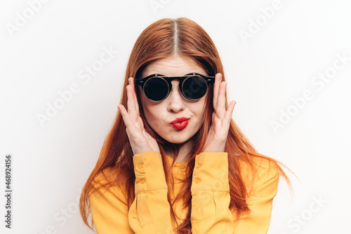 fashionable woman wearing sunglasses red lips charm © VICHIZH