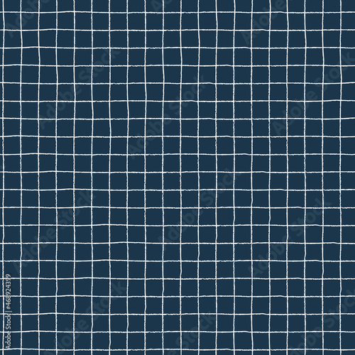 Seamless checkered repeating pattern with hand drawn white grid on dark background for wrapping paper, textile, surface design and other design projects
