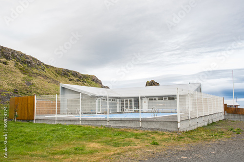 The swimming pool in village of Drangsnes in Strandir in Iceland photo