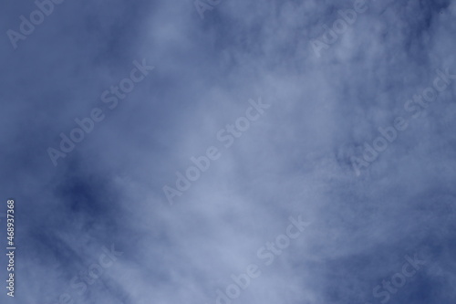 Beautiful white fluffy clouds on a deep blue sky