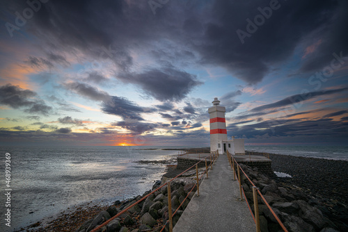 The old Gardur lighthouse at sunset, Iceland. photo