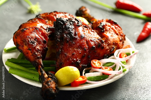 Arabian cooking- tasty grilled chicken- traditional Arabic recipes background.