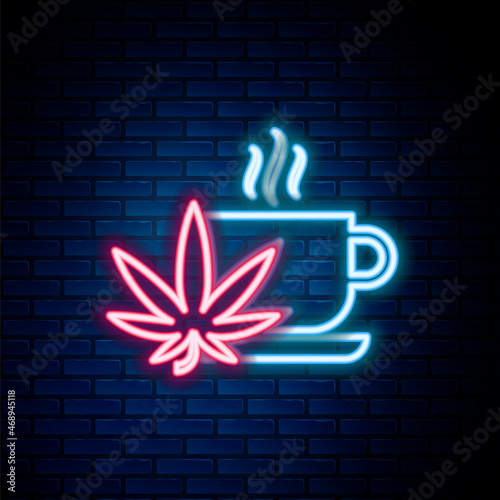 Glowing neon line Cup tea with marijuana or cannabis leaf icon isolated on brick wall background. Marijuana legalization. Hemp symbol. Colorful outline concept. Vector