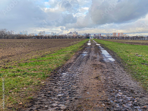 Deep gauge off-road vehicles in the field. Mobile photo