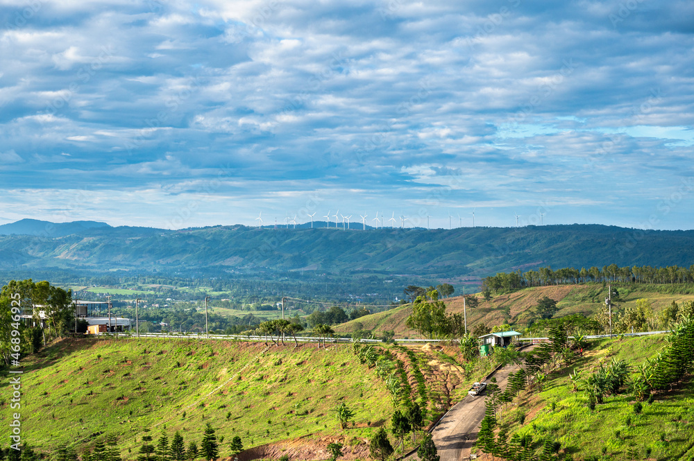 Naklejka premium Wind turbines in the mountains with agricultural area, Phetchabun province, Thailand.