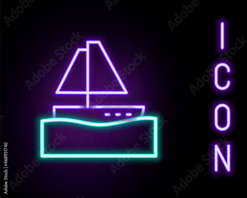 Glowing neon line Yacht sailboat or sailing ship icon isolated on black background. Sail boat marine cruise travel. Colorful outline concept. Vector