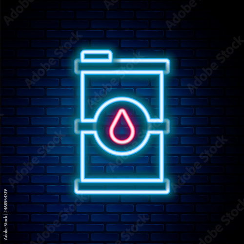 Glowing neon line Bio fuel barrel icon isolated on brick wall background. Eco bio and canister. Green environment and recycle. Colorful outline concept. Vector