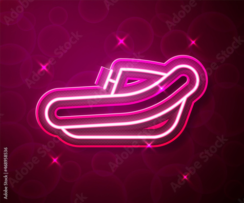 Glowing neon line Inflatable boat with outboard motor icon isolated on red background. Vector
