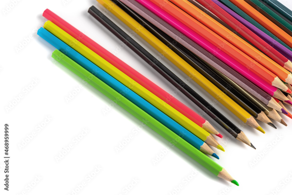 close up of colour pencils isolated on white background close up of colour pencils isolated on white background