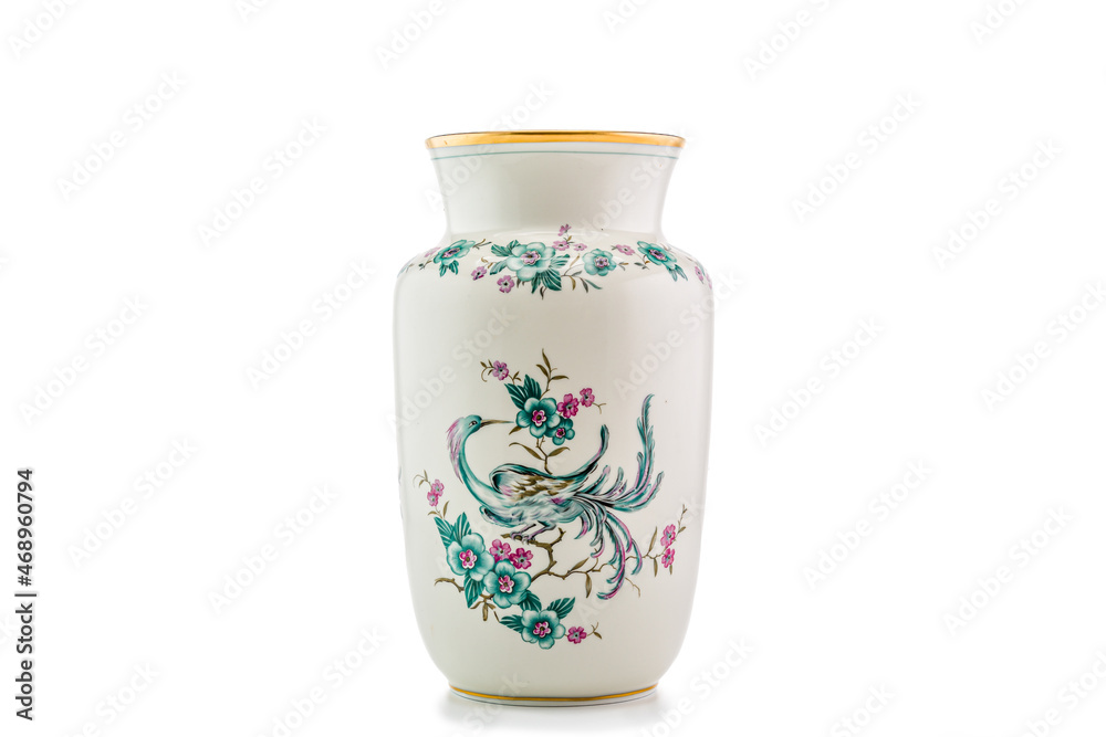 Vase mit Paratisvogel, weiser Hintergrund Vase mit Paratisvogel, weiser Hintergrund