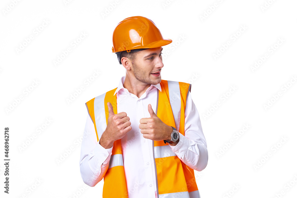 working man in orange uniform posing construction working man in orange uniform posing construction