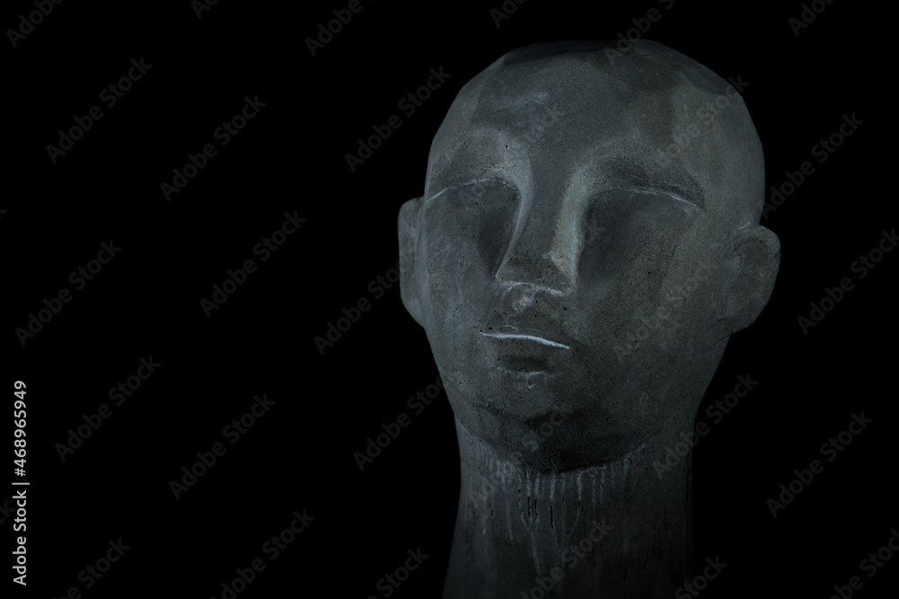 Obraz premium portret, rzeźba głowy z kamienia, czarne tło