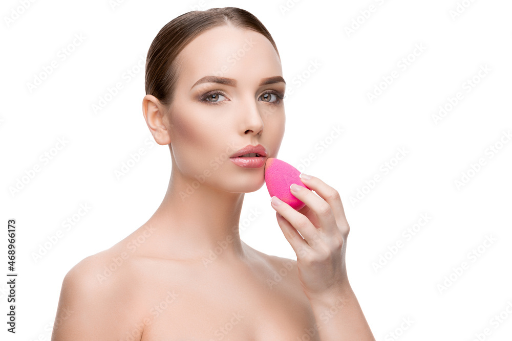 Beautiful Young Woman with Clean Fresh Skin using beauty egg isolated on white background Beautiful Young Woman with Clean Fresh Skin using beauty egg isolated on white background