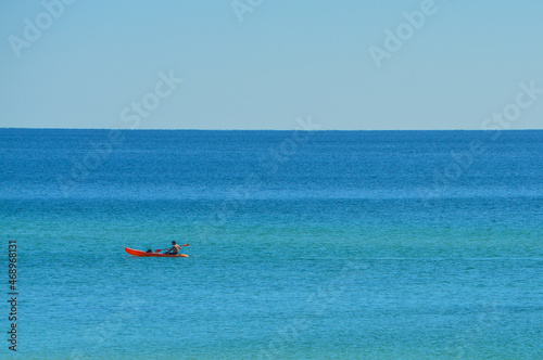 Kayaker off of Miramar Beach on the Gulf of Mexico in South Walton, Florida
