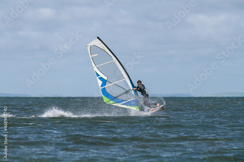 A windsurfer rides in the Black Sea, Russia.