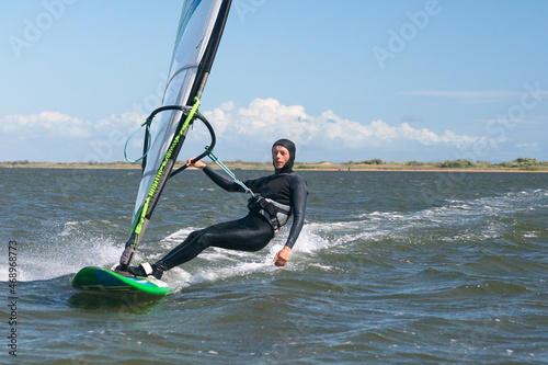 A windsurfer rides in the Black Sea, Russia.