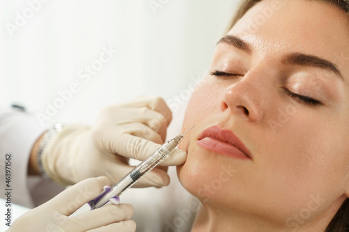 Canvastavla Woman during facial filler injections in aesthetic medical clinic