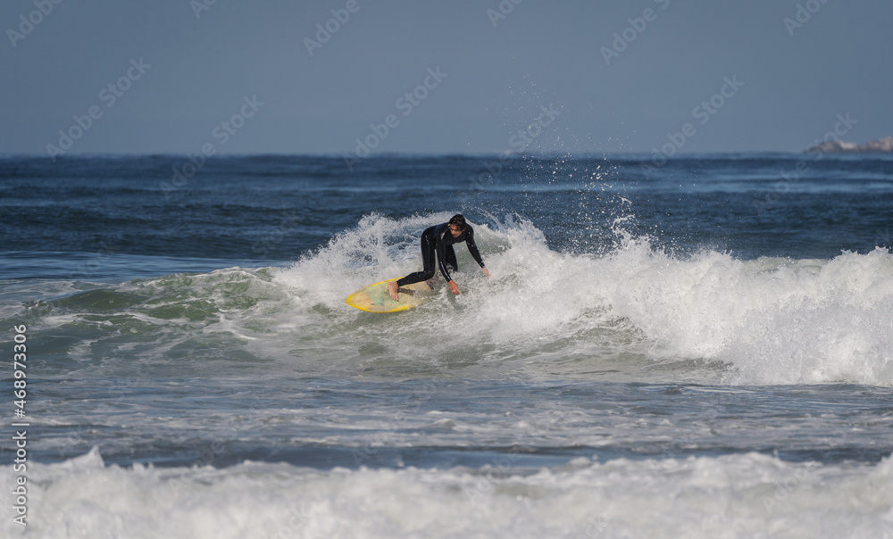 surfing the wave on the beach of La Serena Chile surfing the wave on the beach of La Serena Chile