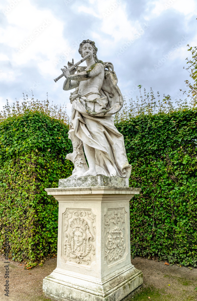 Antique stone statues in the garden of Belvedere Palace, Vienna