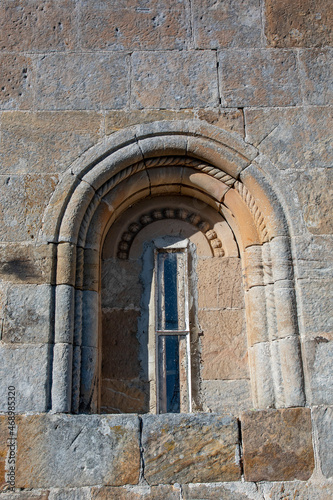 Monophora or window of the Romanesque Church of San Martín in Sobrepenilla, Cantabria - Spain photo