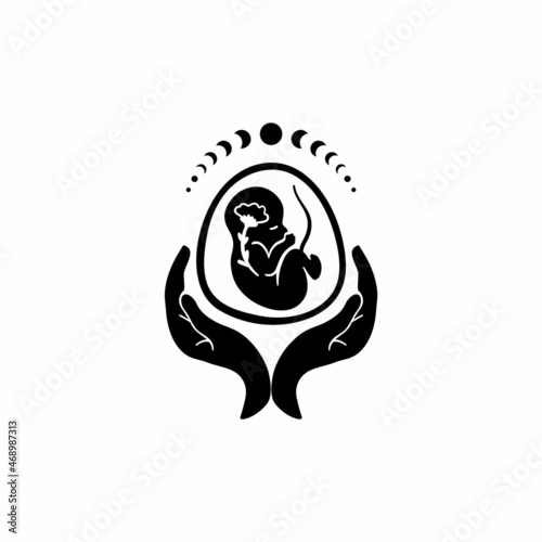 Fetus symbol. Baby in womb and hand. Pregnancy and health care of mother  and baby inside. Round logo of embryo and umbilical cord. Maternal fetus medicine. Embryo on hand. 