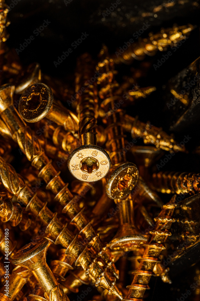 golden torx screws in a box