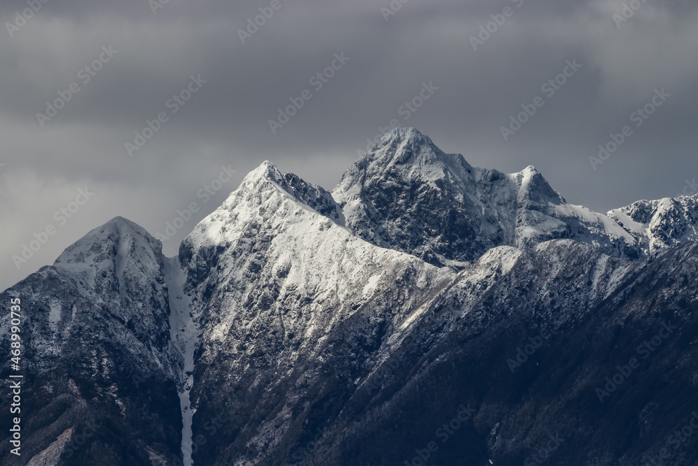 Snowy mountain top on a cloudy day