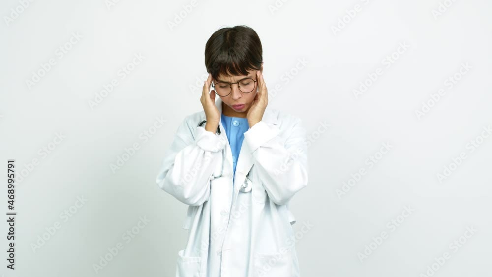 Young woman with nurse uniform unhappy and frustrated with something over isolated background Young woman with nurse uniform unhappy and frustrated with something over isolated background