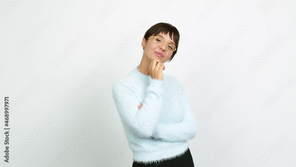 Young woman smiling and looking to the front with confident face over isolated background Young woman smiling and looking to the front with confident face over isolated background