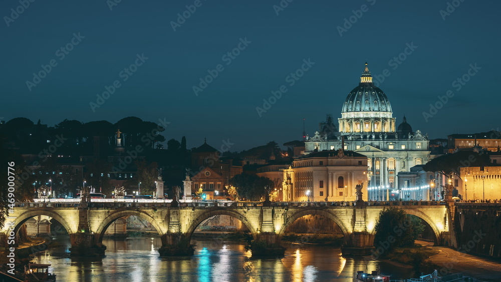 Vatican, Italy. Papal Basilica Of St. Peter In The Vatican And Aelian Bridge In Evening Night Illuminations. Day To NIght Time Lapse. Sunset Time
