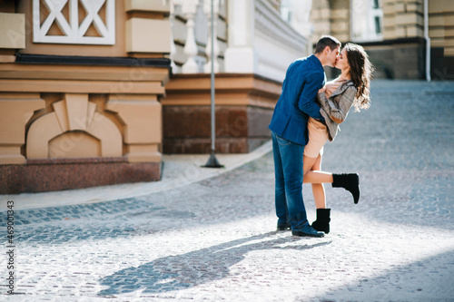 guy and a girl happily walk in the morning on the empty streets