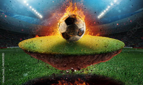 Fiery soccer ball exits from a football stadium © alphaspirit
