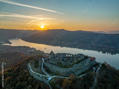 Hungary - The historical Visegrad Castle near Danube river from drone view at sunset