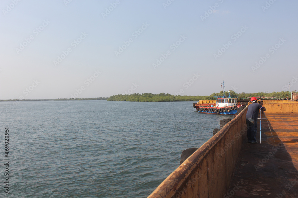 elongated boat on the sea elongated boat on the sea