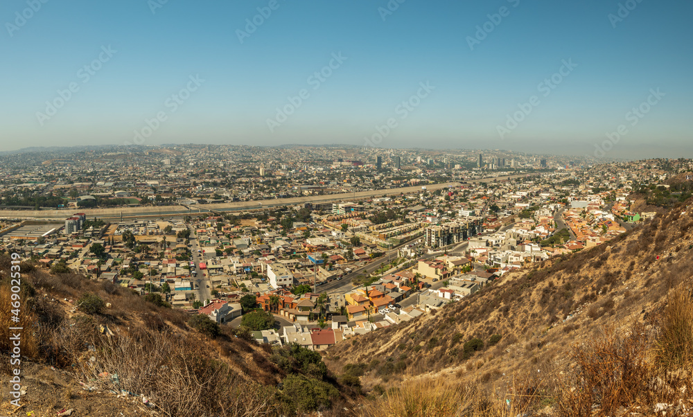 View of Tijuana, Mexico, Baja California. Trash strewn in foreground