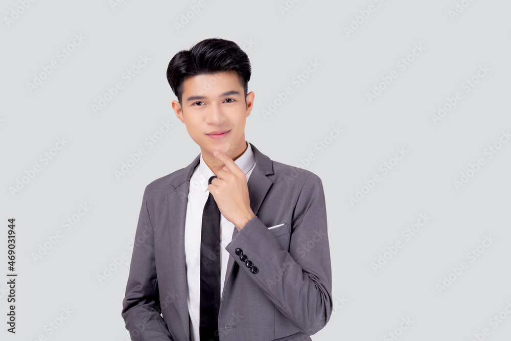 Portrait young asian business man in suit with smart thinking idea isolated on white background, businessman standing and planning for success, handsome manager or executive, emotion and expression. Portrait young asian business man in suit with smart thinking idea isolated on white background, businessman standing and planning for success, handsome manager or executive, emotion and expression.