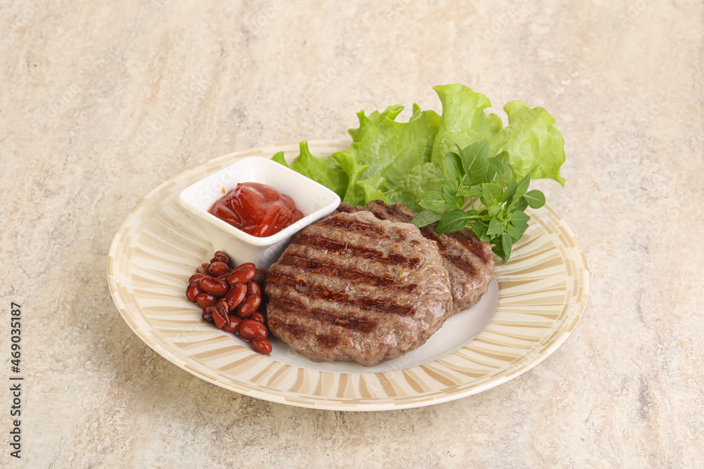 Grilled beef burger cutlet with sauce Grilled beef burger cutlet with sauce