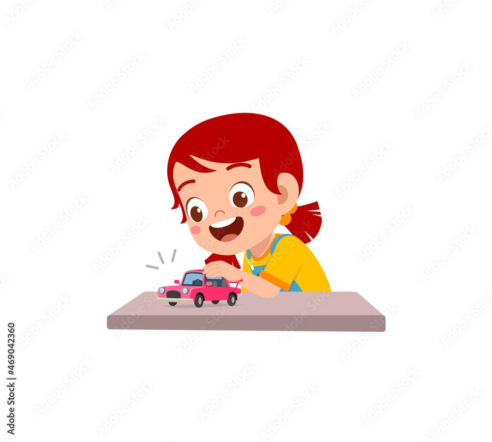 little girl play with small toy car