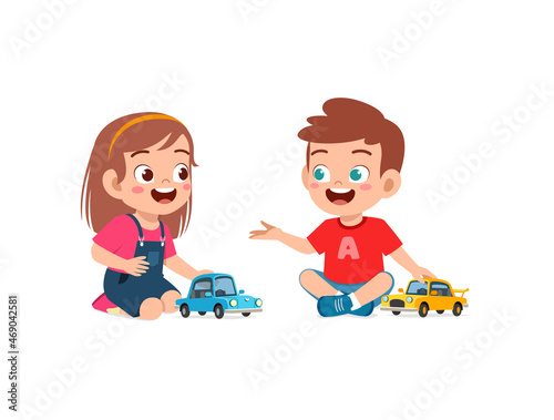 little boy play with small toy car with friend