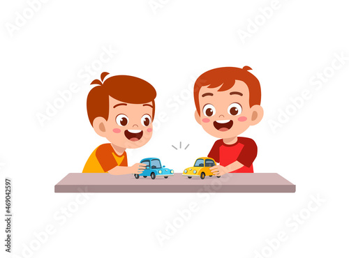 little boy play with small toy car with friend