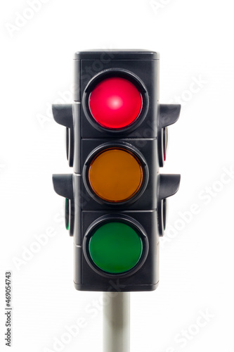Red\\\Close-up view of a traffic light showing an illuminated red stoplight. Concept image illustrating control of the COVID pandemic.