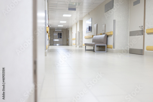Empty hallway of a large building, hospital reception