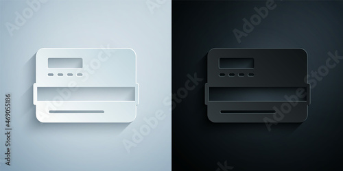 Paper cut Credit card icon isolated on grey and black background. Online payment. Cash withdrawal. Financial operations. Shopping sign. Paper art style. Vector