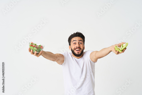 man in white t-shirt plate salad healthy food diet