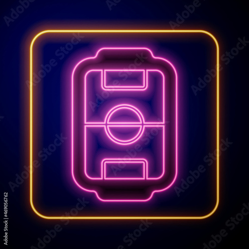 Glowing neon Table football game hobby or leisure icon isolated on black background. Sport team football players. Vector