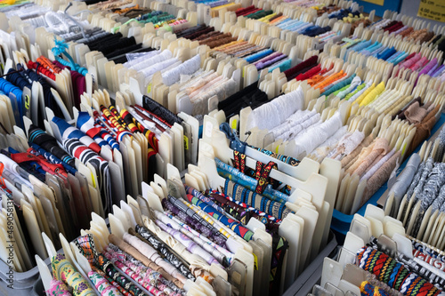 Foto Fabric trims, waistbands and other haberdashery in various colors and sizes disp