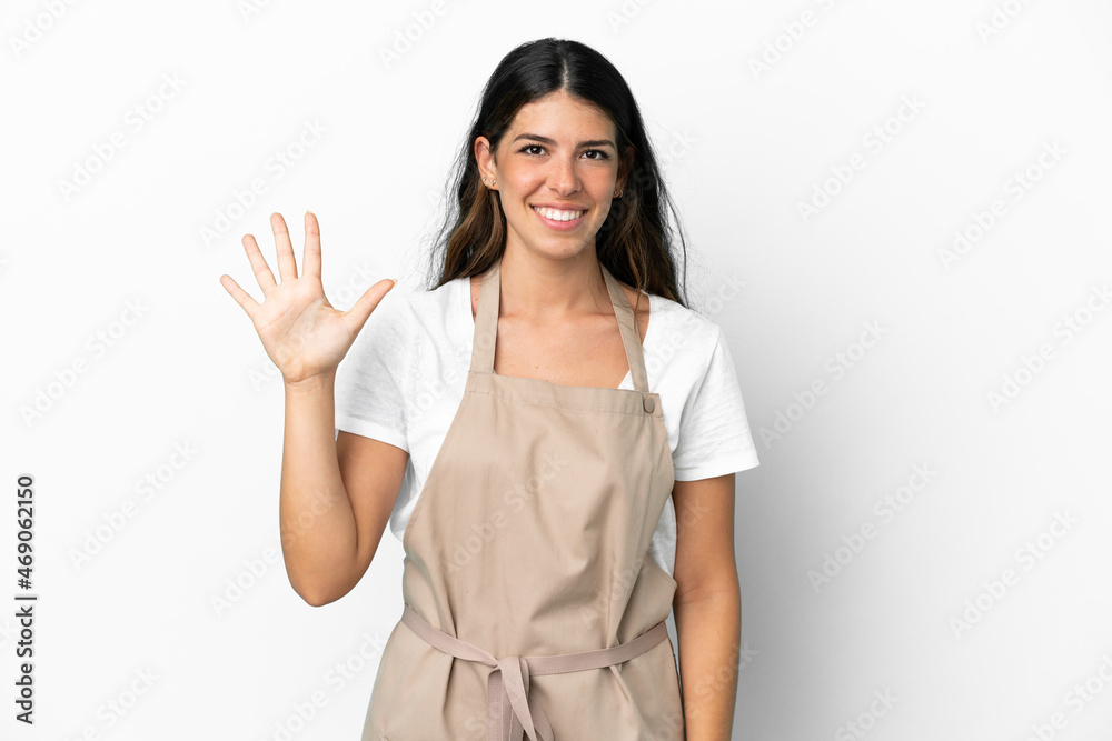 Restaurant waiter over isolated white background counting five with fingers Restaurant waiter over isolated white background counting five with fingers