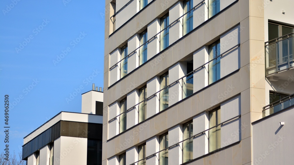 Modern apartment building in sunny day. Exterior, residential house facade. Modern apartment building in sunny day. Exterior, residential house facade.