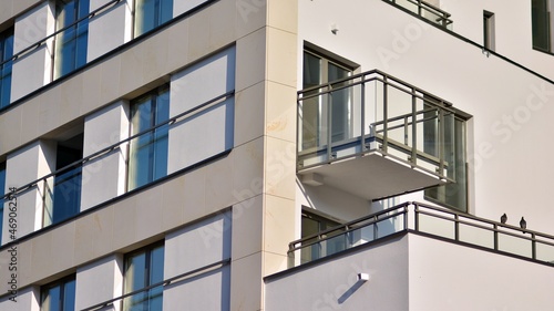 Modern apartment building in sunny day. Exterior, residential house facade.